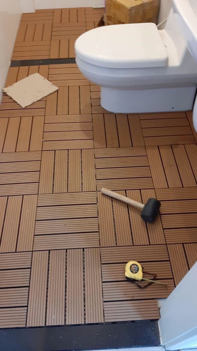 gỗ vỉ lót sàn nhà WC 